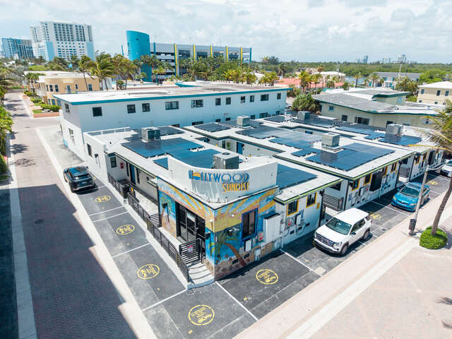Aerial view of the Hollywood Sunrise Hotel and its parking