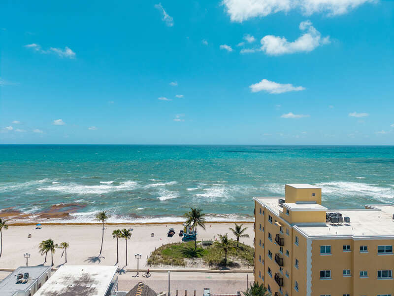 Aerial view over Hollywood Beach with turquoise water and the hotel neighborhood