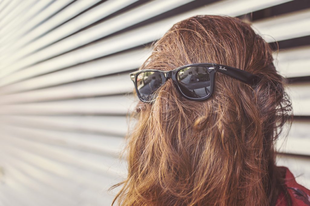 A chewbacca with sunglasses on and long hair.